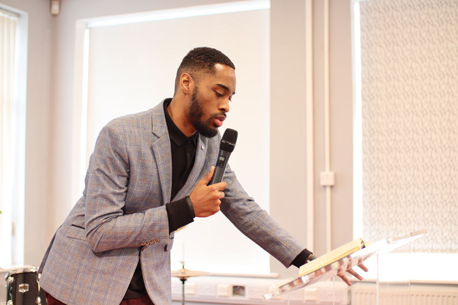 A minister preaching at BBG